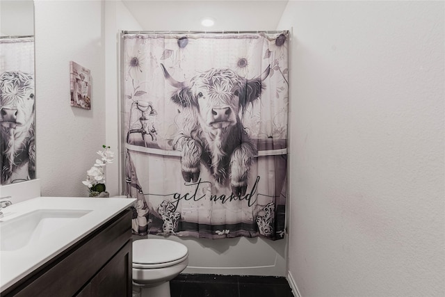 bathroom featuring tile patterned flooring, vanity, toilet, and a shower with curtain