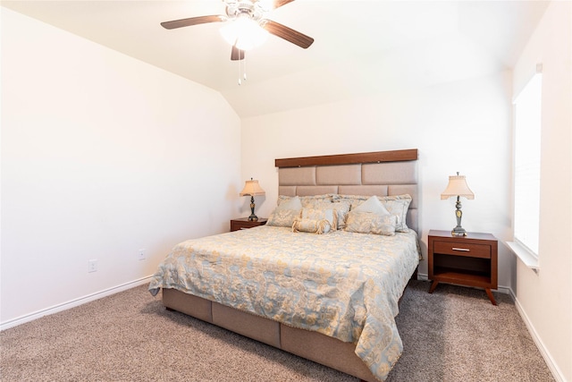 bedroom with lofted ceiling, ceiling fan, baseboards, and carpet flooring