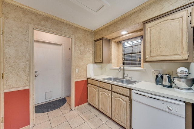 kitchen with dishwasher, a wainscoted wall, light countertops, a sink, and light tile patterned flooring