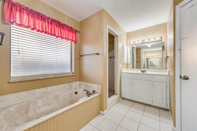 bathroom featuring a bath, tile patterned flooring, vanity, and a shower stall