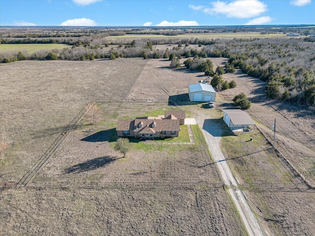 birds eye view of property featuring a rural view