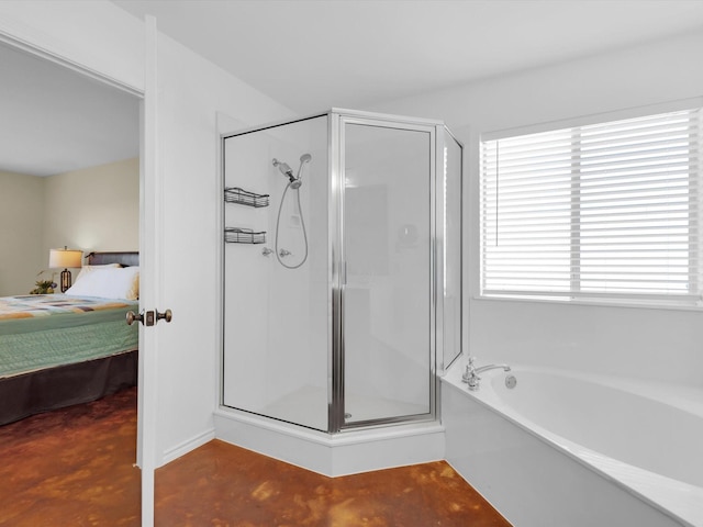 ensuite bathroom featuring a garden tub, ensuite bath, concrete flooring, and a shower stall