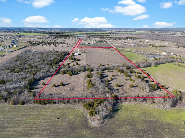 birds eye view of property featuring a rural view