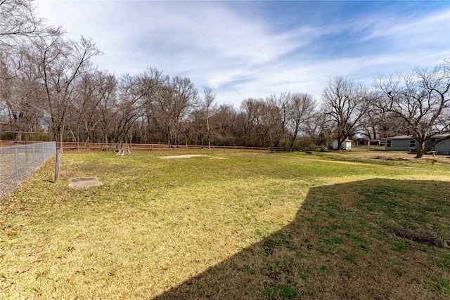 view of yard with fence