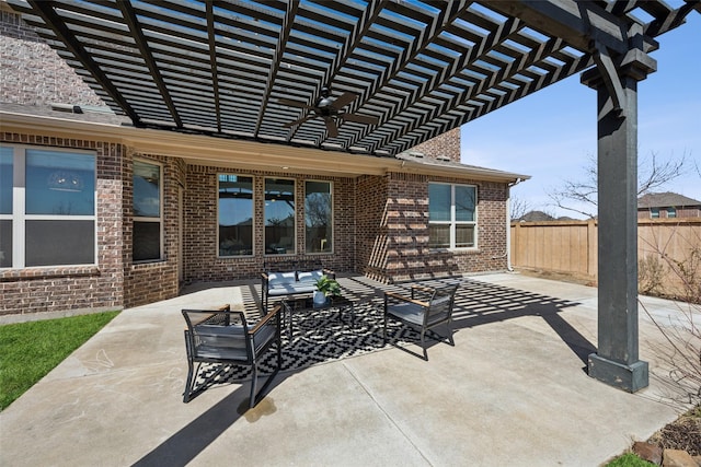 view of patio / terrace featuring fence and a pergola