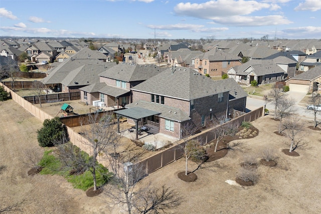 birds eye view of property with a residential view