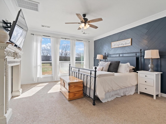 bedroom featuring light carpet, visible vents, and ornamental molding