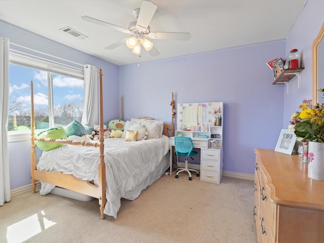 bedroom with visible vents, ceiling fan, light carpet, and baseboards