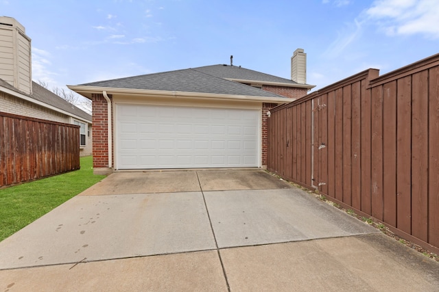 garage with fence