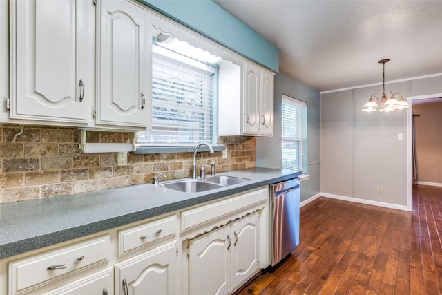 kitchen featuring pendant lighting, tasteful backsplash, stainless steel dishwasher, dark wood-type flooring, and a sink