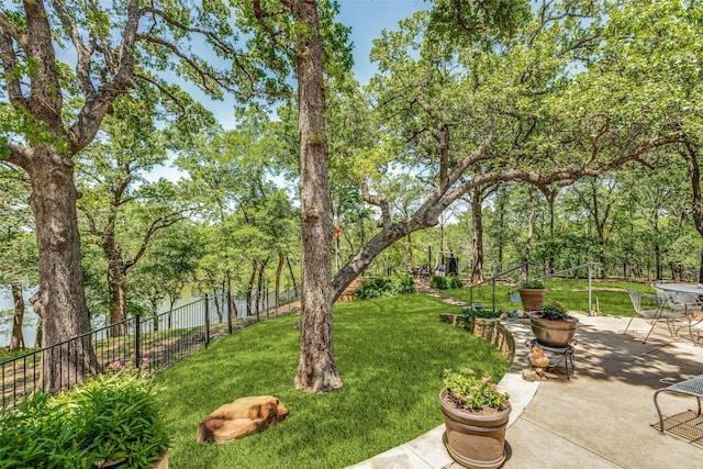 view of yard with a patio area and fence