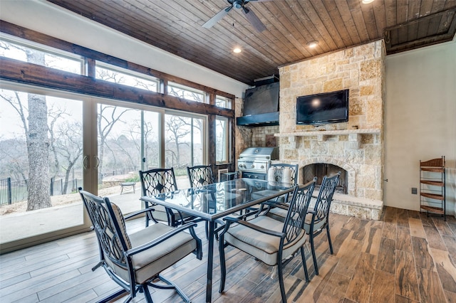 dining area featuring wood ceiling, a ceiling fan, wood finished floors, and recessed lighting