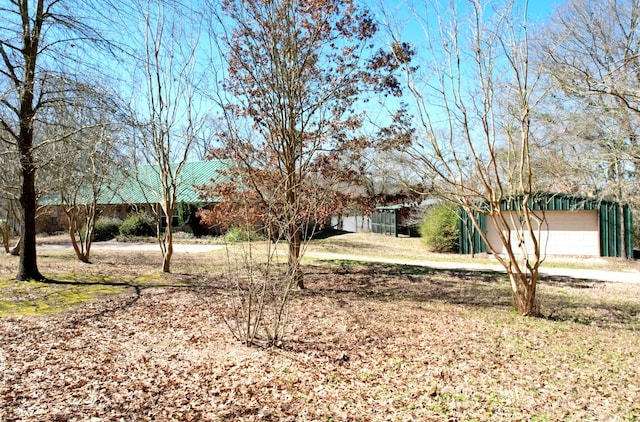 view of yard featuring a garage