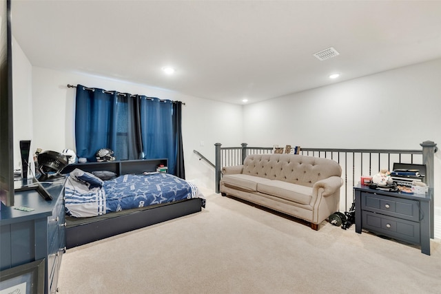 carpeted bedroom featuring recessed lighting and visible vents