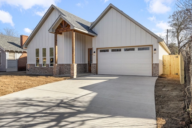 modern farmhouse with brick siding, roof with shingles, concrete driveway, an attached garage, and board and batten siding