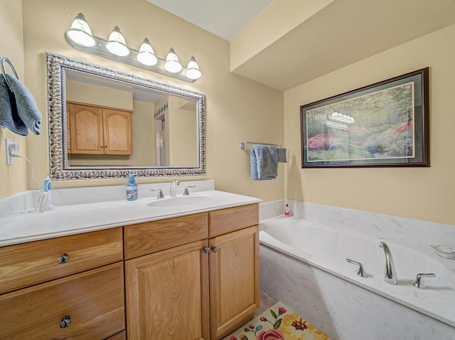 113 S Beltwoods Dr, Desoto, TX 75115 - bathroom with a garden tub and vanity