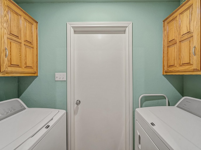 113 S Beltwoods Dr, Desoto, TX 75115 - laundry area featuring washing machine and dryer and cabinet space