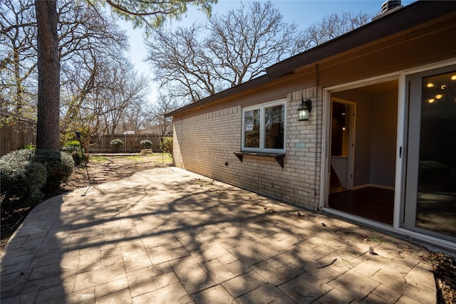 view of patio featuring fence