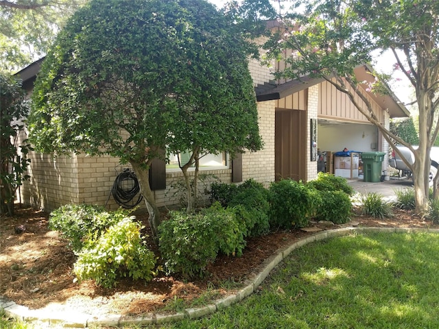 view of home's exterior featuring brick siding