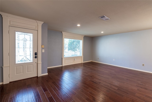 entryway with recessed lighting, wood finished floors, visible vents, and baseboards