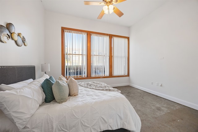 bedroom featuring ceiling fan, carpet floors, and baseboards