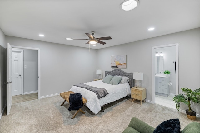 carpeted bedroom featuring ceiling fan, baseboards, connected bathroom, and recessed lighting