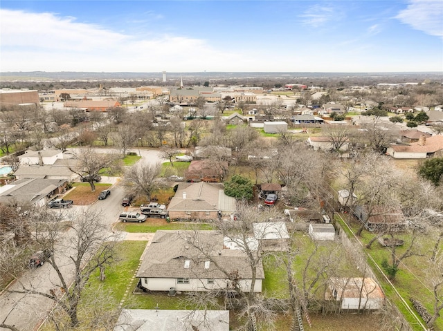 birds eye view of property with a residential view