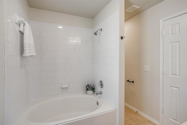 bathroom with tile patterned floors, visible vents, and shower / bathtub combination