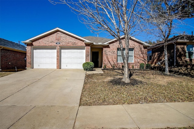 single story home with an attached garage, concrete driveway, and brick siding