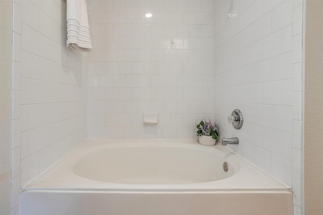 full bathroom with a garden tub