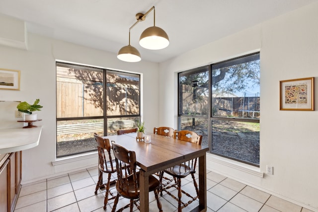 dining room with light tile patterned floors