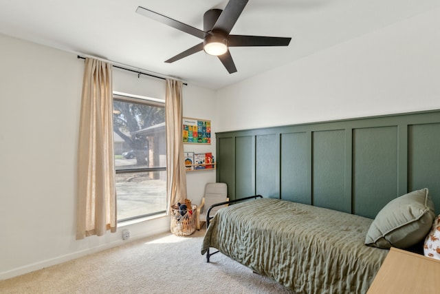 bedroom with ceiling fan and carpet flooring