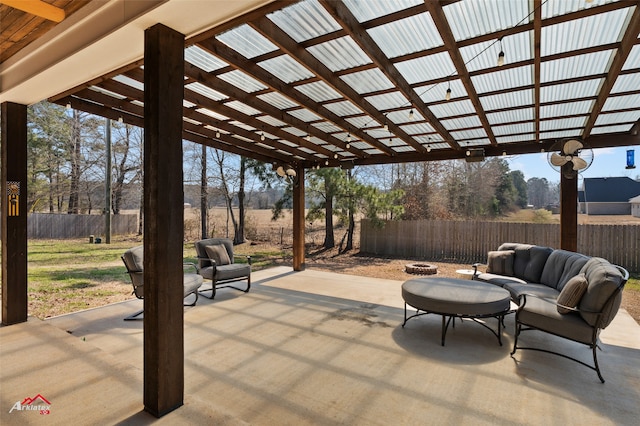 view of patio / terrace with an outdoor hangout area, fence, and a pergola