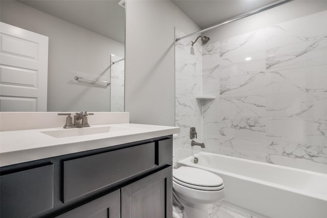 full bath featuring marble finish floor, shower / bathing tub combination, vanity, and toilet