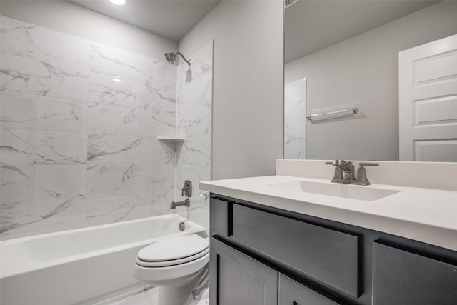 bathroom with marble finish floor, shower / washtub combination, vanity, and toilet