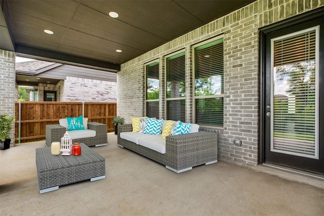 view of patio / terrace with fence and outdoor lounge area