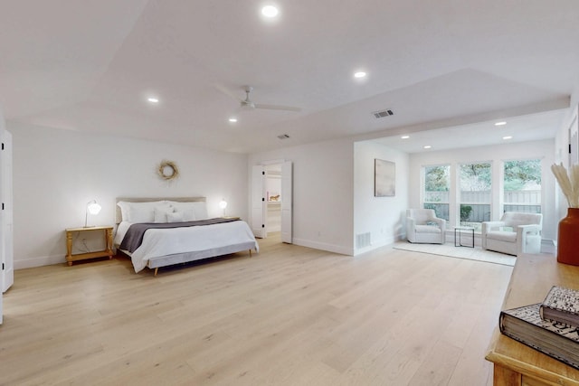 bedroom with light wood-style floors, recessed lighting, and visible vents