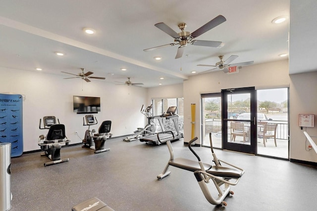 exercise room with recessed lighting and baseboards