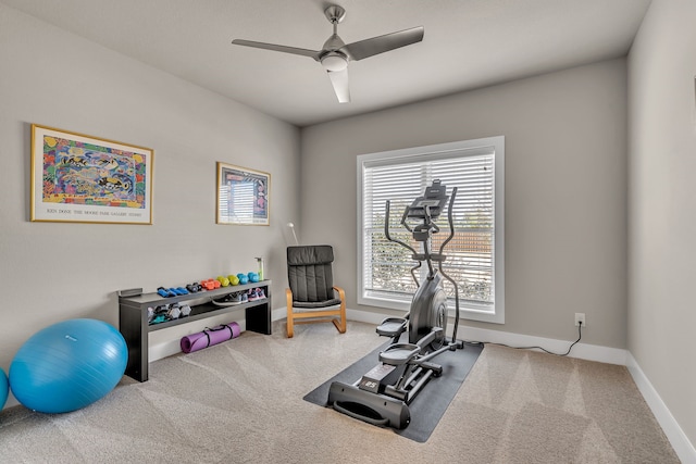 exercise room with ceiling fan, carpet floors, and baseboards