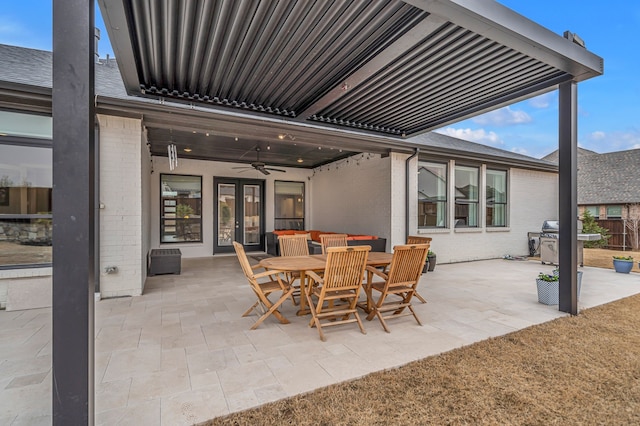 view of patio / terrace with outdoor dining area, a grill, and a ceiling fan