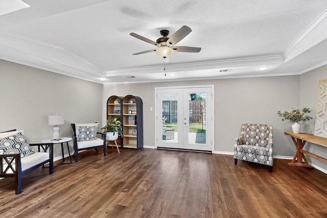 1721 Plummer Dr, Rockwall, TX 75087 - living area with a raised ceiling, wood finished floors, crown molding, a ceiling fan, and french doors