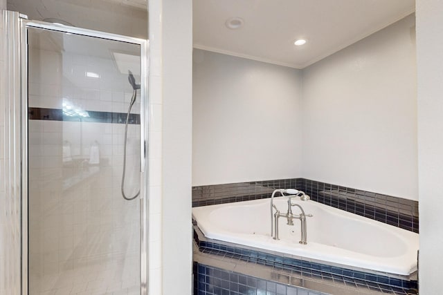 full bathroom with a bath, recessed lighting, a shower stall, and ornamental molding