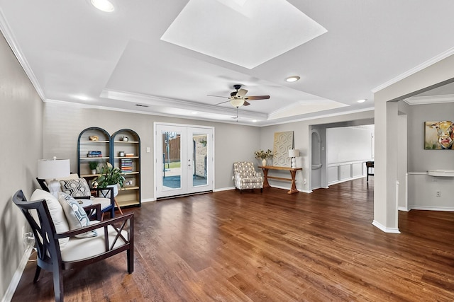 1721 Plummer Dr, Rockwall, TX 75087 - living area featuring a raised ceiling, ornamental molding, wood finished floors, ceiling fan, and recessed lighting