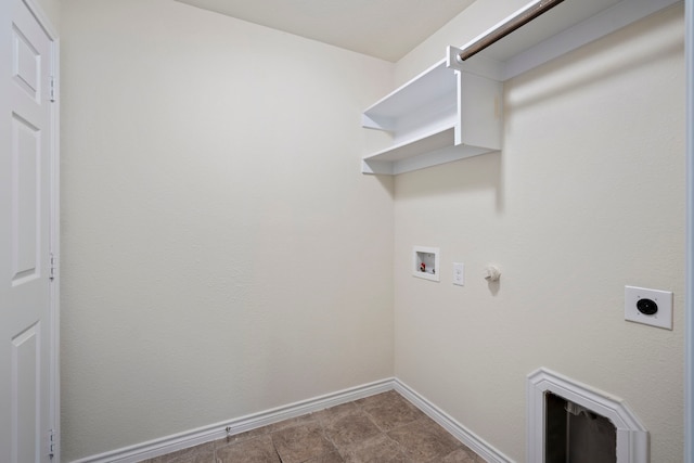 laundry room featuring hookup for a washing machine, hookup for a gas dryer, electric dryer hookup, laundry area, and baseboards