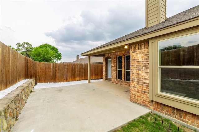 view of patio featuring a fenced backyard