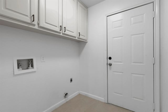 laundry room featuring light tile patterned floors, hookup for a washing machine, hookup for an electric dryer, baseboards, and cabinet space