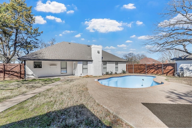 view of pool featuring a fenced in pool, a patio area, a gate, and a fenced backyard