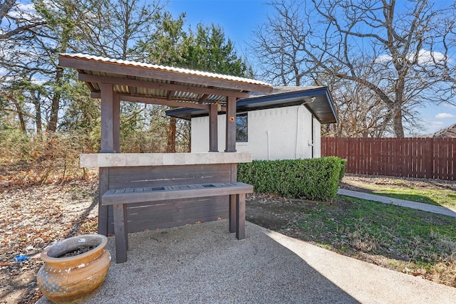 view of patio with fence