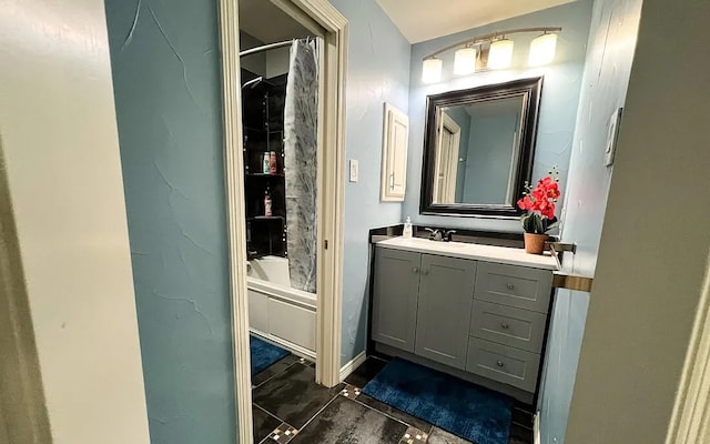 bathroom with shower / bath combination with curtain and vanity