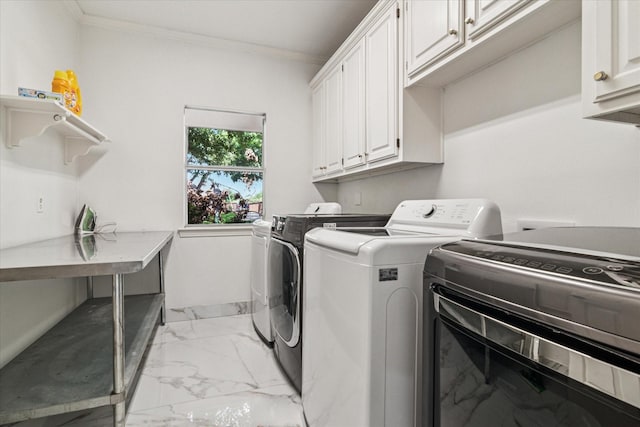 2616 NW Lambda Ln, Flower Mound, TX 75028 - laundry room with cabinet space, washer and dryer, light marble finish flooring, and crown molding